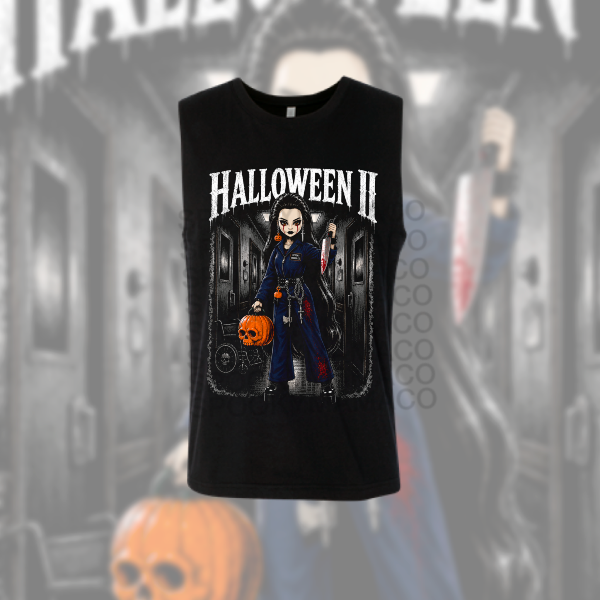 A black sleeveless tank top featuring a graphic print of the character Pennywise from the movie 'Halloween II' with the text 'HALLOWEEN II' above, shown against a dark, blurred Halloween-themed background.